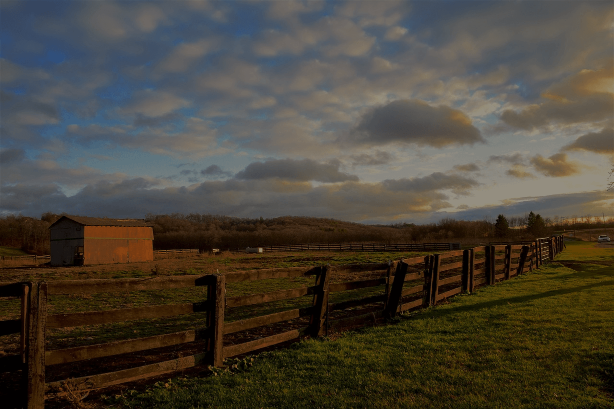 Image of a farm with a fence